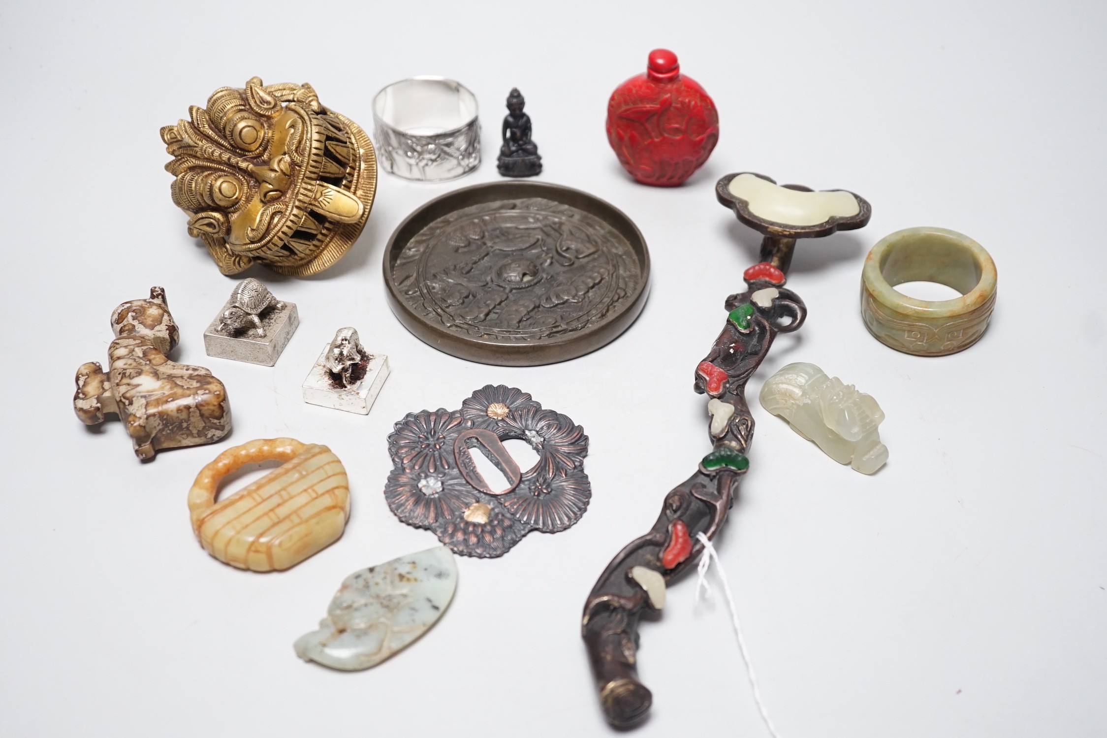 A selection of various Oriental items, including Chinese hardstone carvings, Japanese cast bronze mirror, snuff bottle, Japanese napkin ring etc.